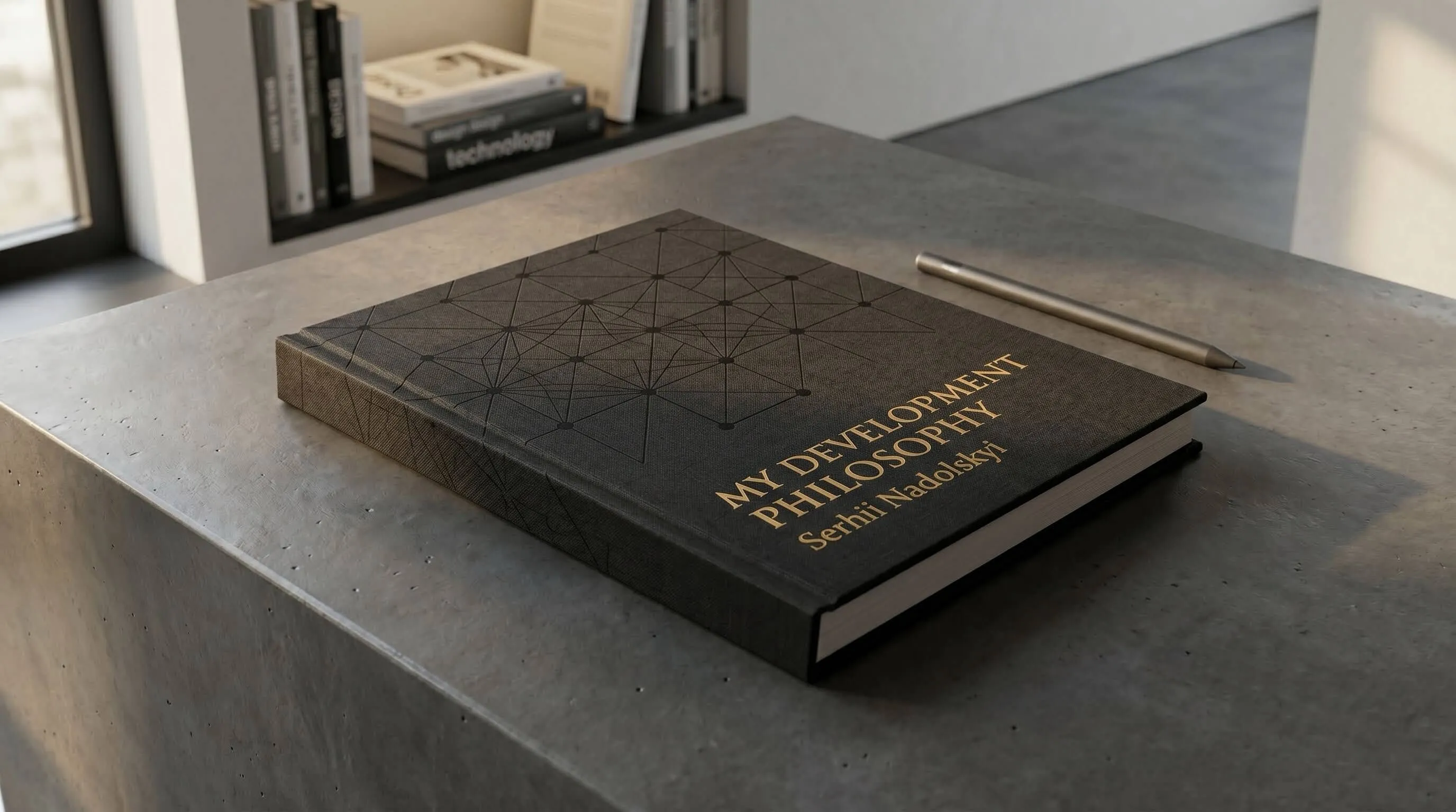 A sleek dark book titled 'My Development Philosophy' by Serhii Nadolskyi resting on a concrete desk.